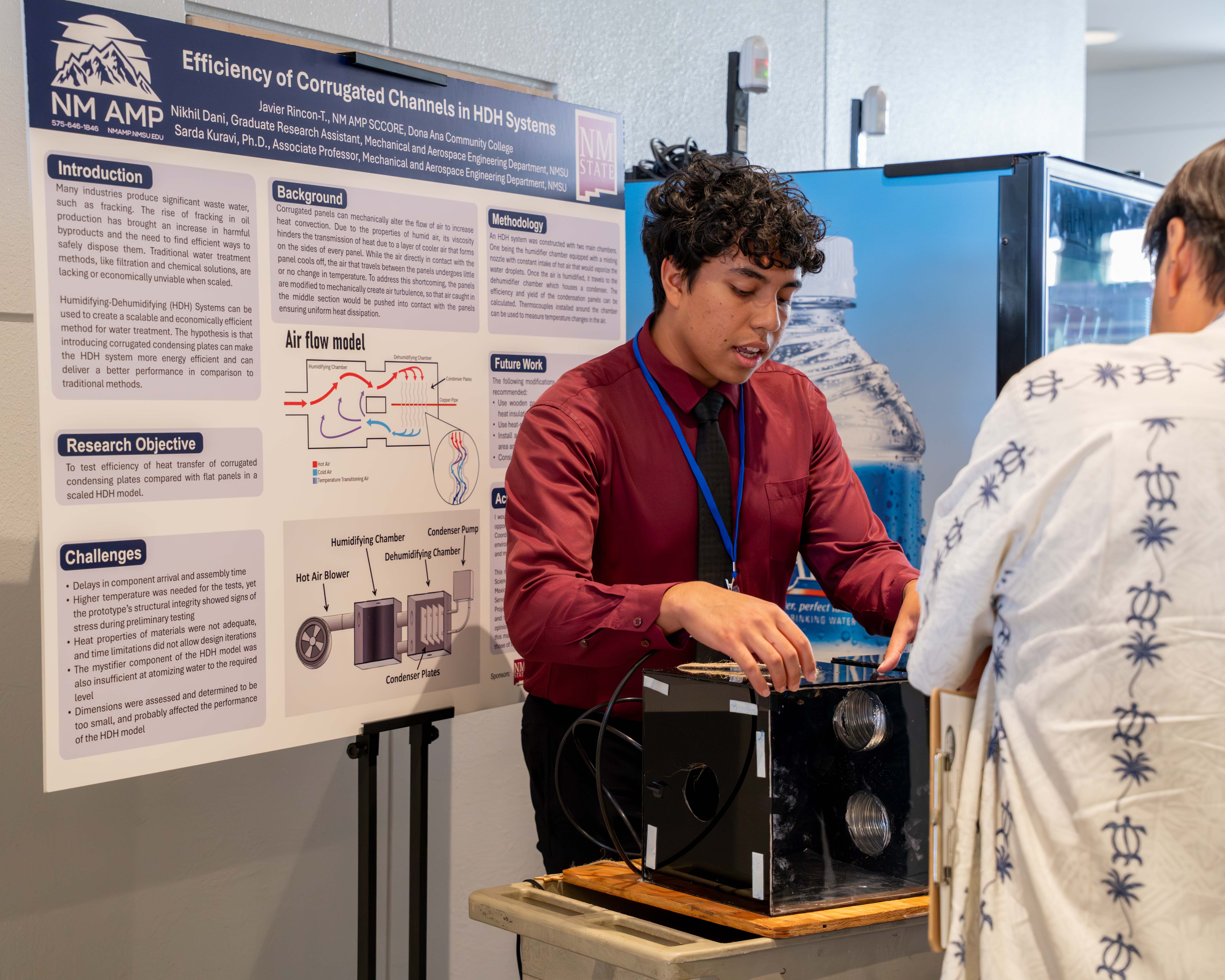 NMSU SCCORE 2026 student presenting poster at the annual Symposium.
